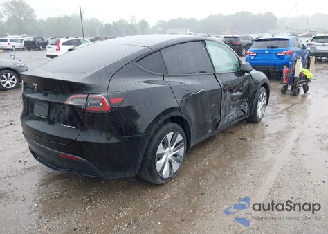 2023 Tesla Model Y Awd/Long Range Dual Motor All-Wheel Drive z USA, uszkodzony, nr VIN 7SAYGDEE2PA105631